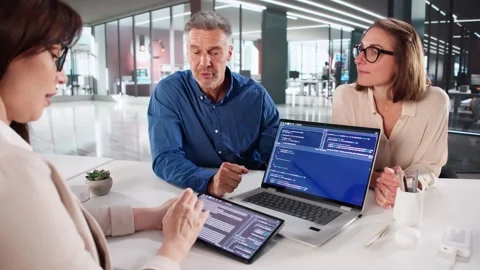 Team Developing Code On Laptop And Tablets Stock Footage 320257804