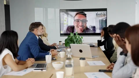 Team Discussion with Virtual Participant Stock Footage 298800653