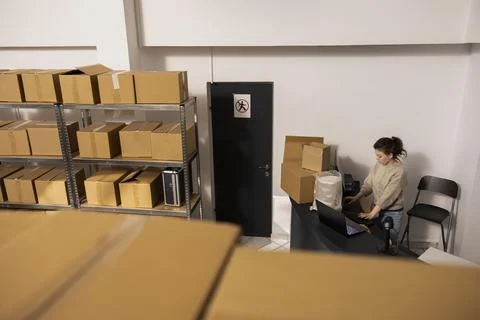 Team of dispatch workers managing shipment quality control Stock Photos