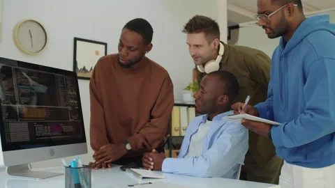 Team of Diverse Programmers Trying to Fix Bags in App Code at Office Stock Footage 277412743