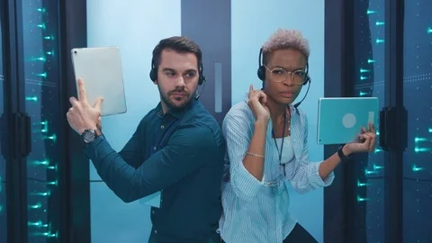Team of diverse special agents man and woman aiming digital guns performing Stock-Footage 119842653