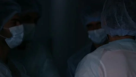 The team of doctors is having a meeting about the COVID-19 outbreak. Stock Footage 167633140