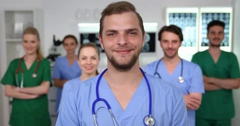 Team of Doctors People Looking Camera Optimistic Presentation Medical Concept Stock Footage 83440625