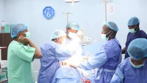 A team of doctors performing surgery Stock-Footage 92485118