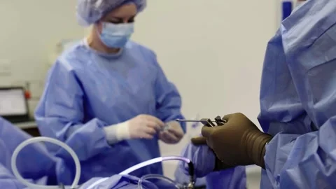 A team of doctors - surgeons performing a surgical operation Stockbeeldmateriaal 269429218