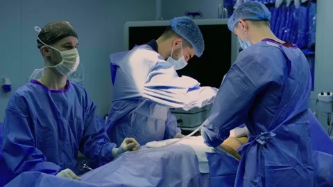 A team of doctors - surgeons performing a surgical operation Stock-Footage 270451177
