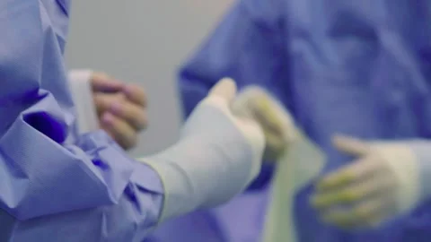 A team of doctors - surgeons performing a surgical operation Stock Footage 270462340