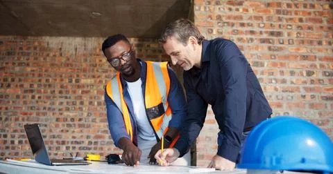 Team, documents and architect with people on construction site for blueprin.. Stock Photos