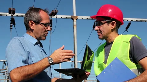 Team of Electrical Controls Engineers Working on Project Outdoors Stock Footage 159311960