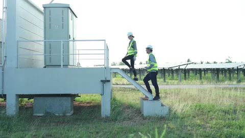A team of electrical engineers is inspecting an energy storage Stock Footage 255225017