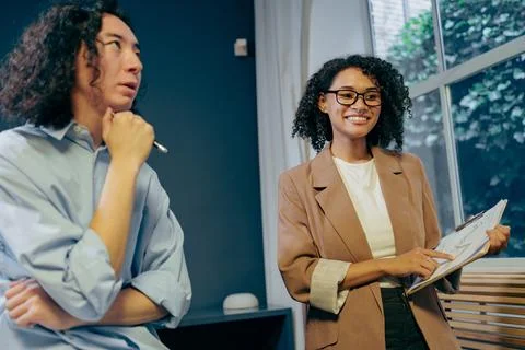 Team ends confidently, team wraps up discussion with positive and confident Stock Photos