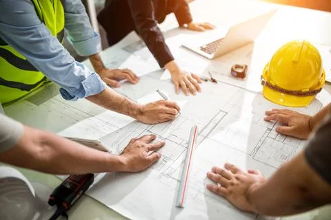Team Engineer drawing graphic planning of interior creation project Stock Photos