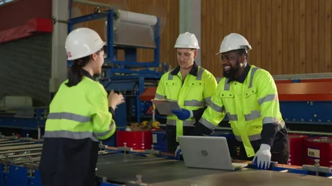 Team engineer examining and measuring steel together with expertise at factory. Stock Footage 228858577