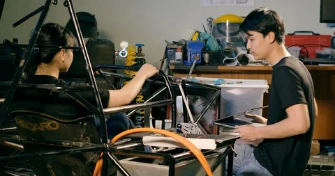 Team of engineer fixing car robot in lab together. Stock Footage 113119552