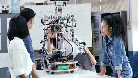 Team engineer start up for robot project together. Stock Footage 94103914