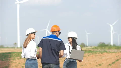 Team of engineers and architects working on wind turbines Stock Footage 264134945