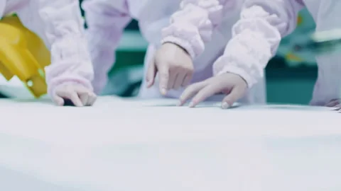 Team of engineers and technicians collaborates on project mechanical motor Stock Footage 347908808
