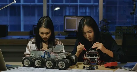 Team of engineers building robotics prototype in laboratory. Video stock 111846962