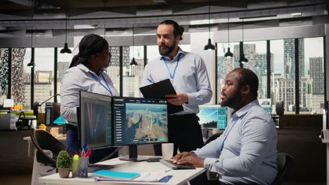 Team of engineers in office doing green energy production technology testing Stock Footage 315619038