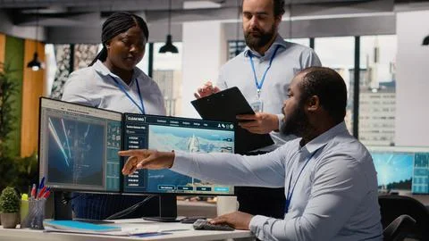 Team of engineers in office doing green energy production technology testing Stock Photos