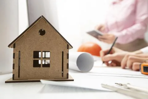 A team of engineers or architects develops a blueprint for a building Stock Photos