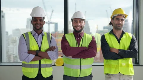 Team of engineers standing with their arms crossed shows their confidence Stock Footage 241322546