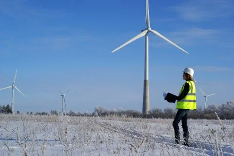 Team of engineers with wind turbines Stock Photos