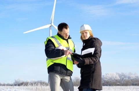Team of engineers with wind turbines Stock Photos