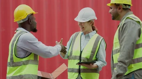 Team of engineers workers shaking hands after success working at container yard. Stock-Footage 264759573