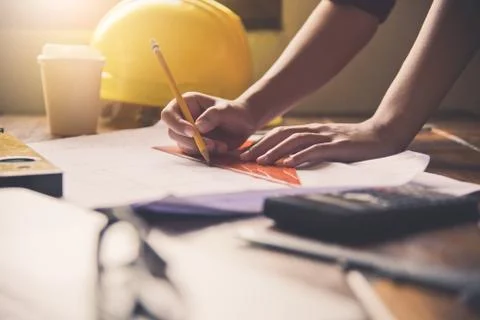 Team of engineers working together in a architect office. Stock Photos