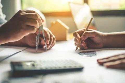 Team of engineers working together in a architect office. Stock Photos