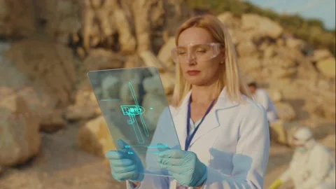 Team of Expert Scientists Exploring Land for Future Plant Construction. Female Stock Footage 137821893