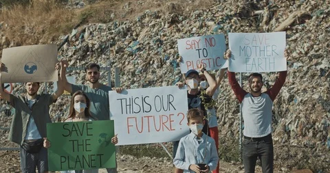 Team of fighting eco volunteers protesting against pollution and overconsumption Stock Footage 115375533