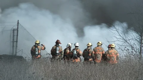 Team Of Fire Fighters At The Scene Of A Large Fire Video stock 87052061
