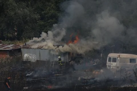 A team of firefighters extinguished a fire near the southern ring road in Sofia Stock Photos