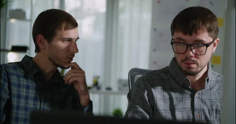 Team of Focused Programmers Collaborating on a Project. Stock Footage 306738471