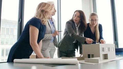 Team of four female architects at work  Stock-Footage 111315908