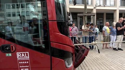 Team at the fun competition in the bus pulling Stock Footage 115422356