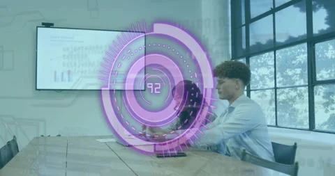 Team gesturing at screen and scrolling data animating bar charts for business Stock Footage 318173139