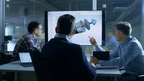 Team of Industrial Engineers Discuss 3D Turbine/ Engine Part Design  Stock Footage 77564836