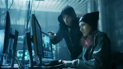 A female hacker in action using the co, Stock Video