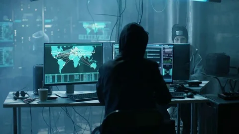 Team of Internationally Wanted Hackers Teem Organize Advanced Virus Attack  Stock Footage 76079328