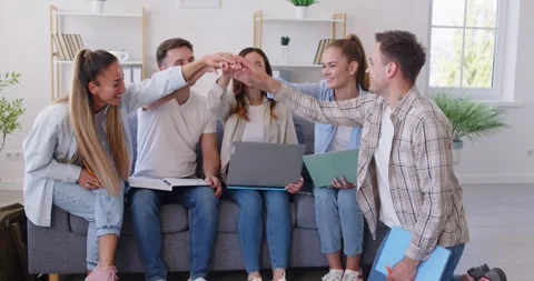 Team of IT college students having fun as they finish working on group study Stock Footage 322556524