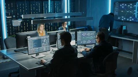 Team of IT Programers Working on Desktop Computers in Data Center Control Room. Stock Footage 103269026