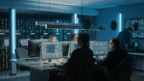 Team of IT Programers Working on Desktop Computers in Data Center Control Room. Stock Footage 103269206
