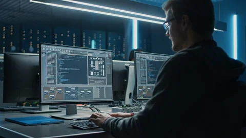 Team of IT Programers Working on Desktop Computers in Data Center System Control Stock Footage 103269864