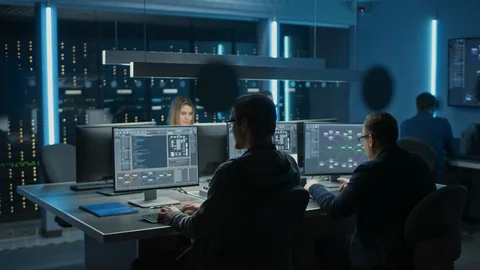 Team of IT Programers Working on Desktop Computers in Data Center System Control Stock Footage 103270008