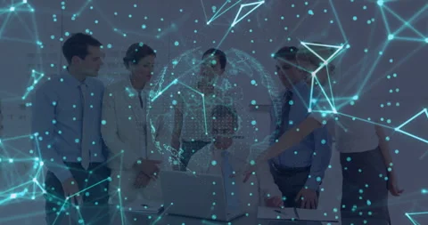Team at laptop observing globe nodes while engineer tapping trackpad zooming for Stock Footage 312071609