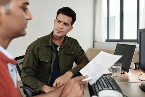 Team Lead Explaining Work to Developer Stock Photos