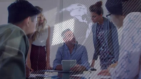 Team lead presenting tablet, causing globe overlay fading in while team Stock Footage 330142826